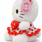Hello Kitty wearing a strawberry-themed outfit